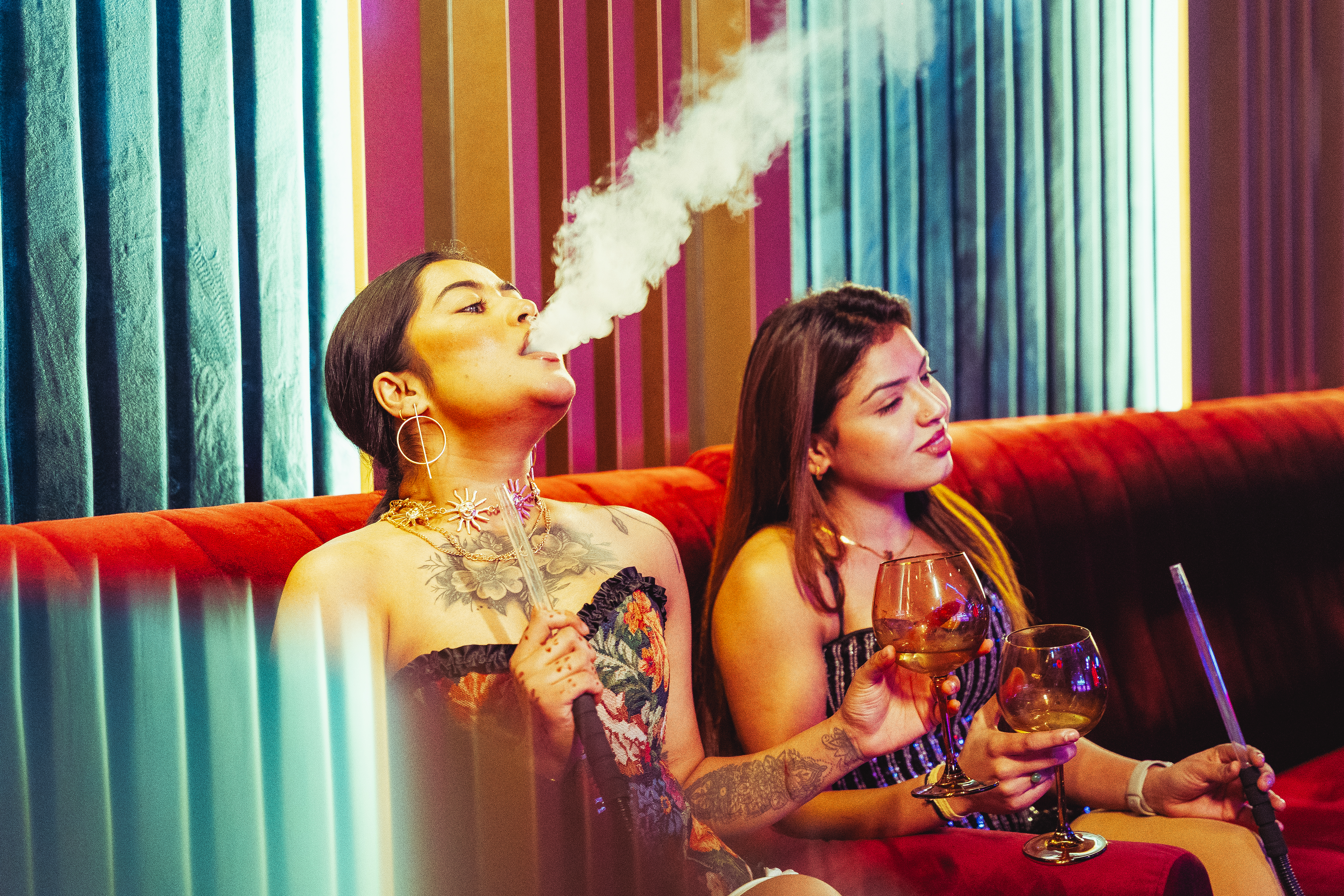 Models enjoying shisha at Shoukeen Dubai